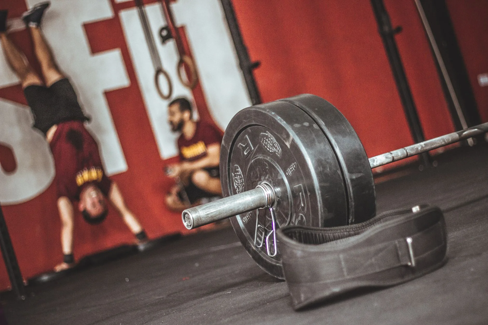 A loaded barbell in a representative training space
